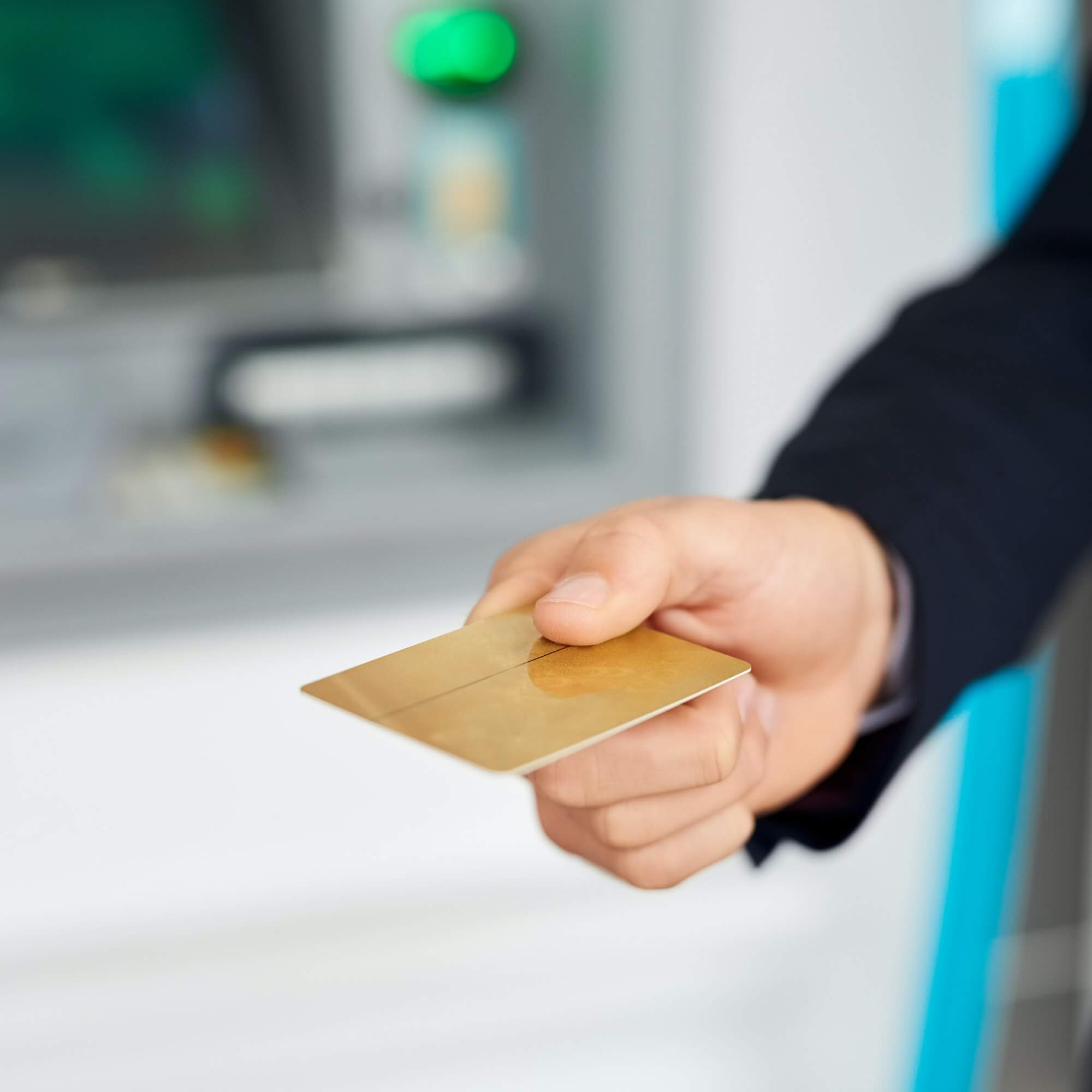 Transactions made simple. Closeup shot of an unidentifiable businessman holding out a credit card.
